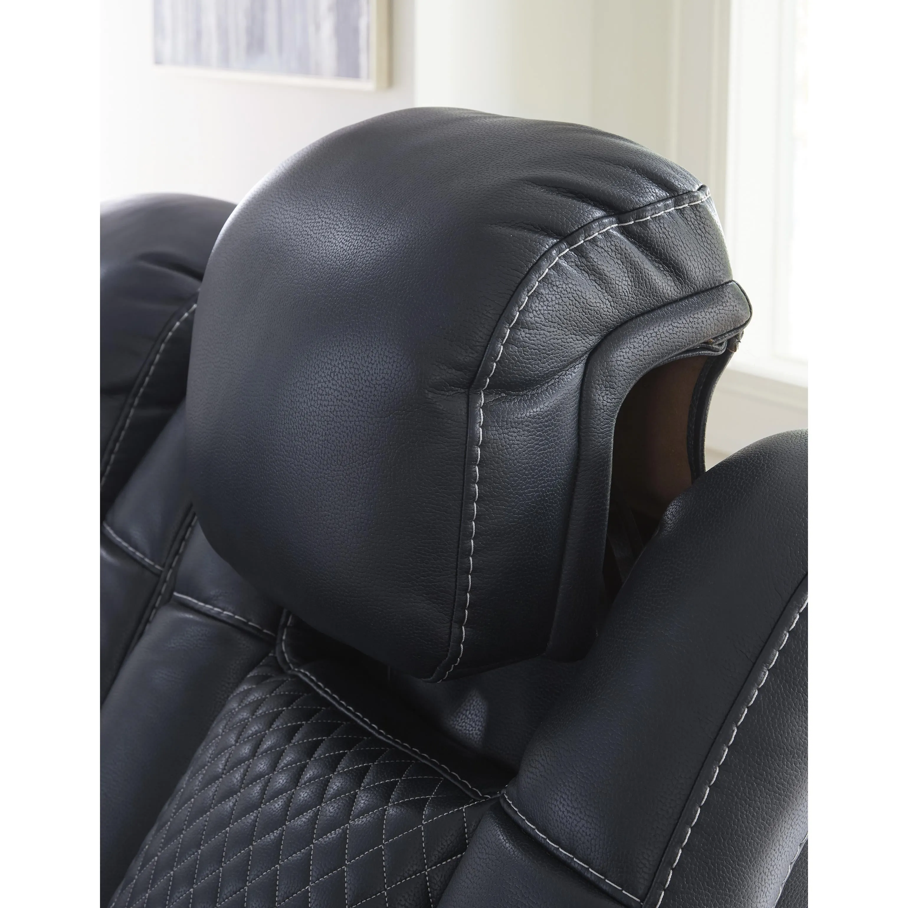 Signature Design by Ashley Fyne-Dyme Power Reclining Leather Look Loveseat with Console 3660318